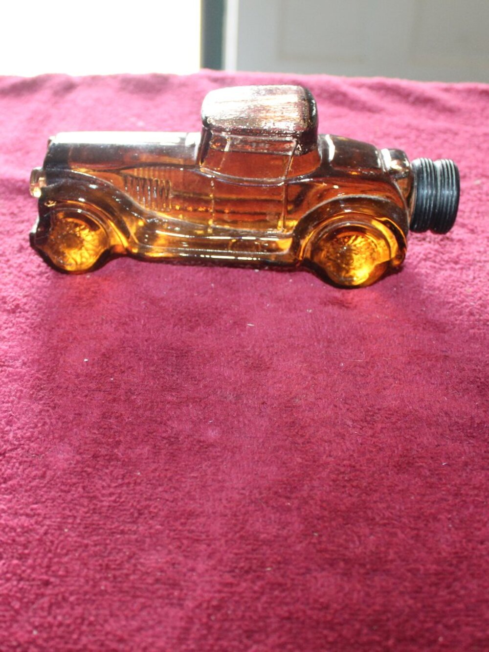 Vintage Avon "Sterling Six" decanter, designed to look like a classic roadster